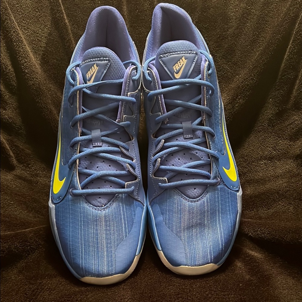 Nike Blue and Yellow Athletic Shoes with Sleek Design